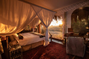 A Bedroom at Selinda Camp with the Sun Setting | Okavango Delta | Botswana Safaris | The Ultimate Travel Company
