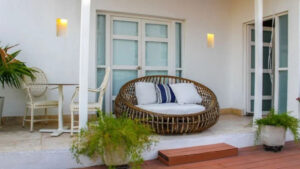 Hotel Boutique Don Pepe, Santa Marta | Columbia | hallway with chiar | The Ultimate Travel Company