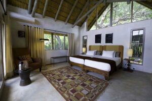 Ongava Lodge, Etosha National Park | Namibia | bedroom | The Ultimate Travel Company