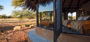 Okonjima Bush Camp, Central Highlands | Namibia | twin bed | The Ultimate Travel Company