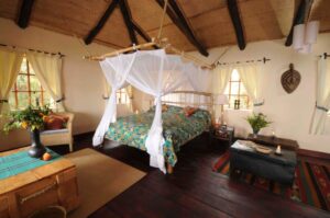 Virunga Safari Lodge, Rwanda | Rwanda | bedroom | Ultimate Travel Company