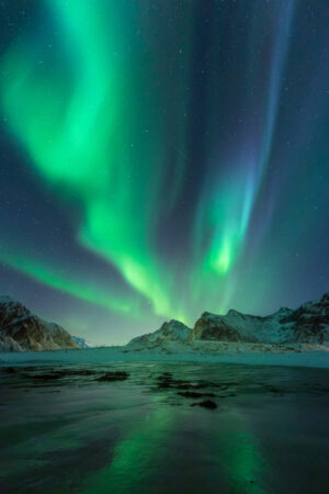 Northern Lights Over Skagsanden | Luxury Arctic Holidays | The Ultimate Travel Company