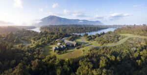 Aerial View of Waitai Lodge on the Hollyford Wilderness Experience| New Zealand Holidays | The Ultimate Travel Company