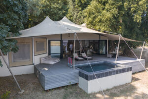 Exterior of Luxury Suite from River at Sausage Tree Camp, Lower Zambezi | Zambia Holidays | The Ultimate Travel Company