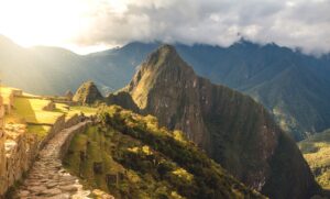 View of Machu Picchu at Sunset, the UNESCO World Heritage Site, Lost City of the Incas and Seven Wonders of the World | Peru Holidays | The Ultimate Travel Company