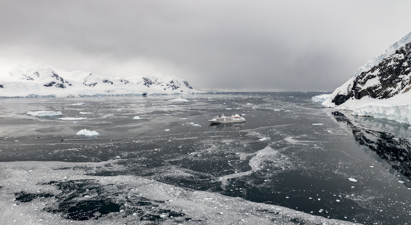 The Silver Cloud Sailing Through Glaciers | Luxury Antarctica Cruises & Holidays | The Ultimate Travel Company