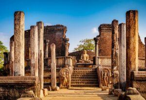 Buddha and Ancient Ruins in Polonnaruwa, one of the UNESCO World Heritage Sites in the Cultural Triangle | Luxury Sri Lanka Holidays | The Ultimate Travel Company