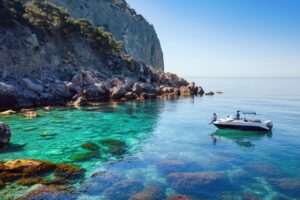A Couple on a Boat Around the Greek Islands for a Luxury Summer Holiday | Luxury Greece Holidays | The Ultimate Travel Company
