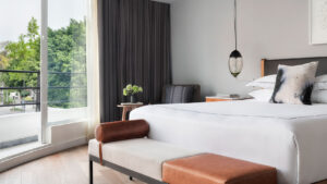King-Size Bed in a Balcony Bedroom at Kimpton Virgilio, a Luxury Hotel in Polanco | Luxury Mexico Holidays | The Ultimate Travel Company