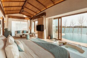 Bedroom in a River Pool Villa at Namia River Retreat in Hoi An | Luxury Vietnam Holidays | The Ultimate Travel Company