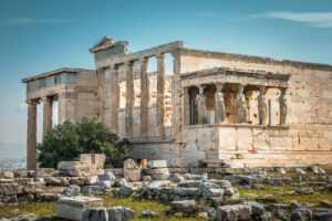 Ancient,Erechtheion,Temple,With,Caryatid,Porch,On,Acropolis,,Athens,,Greece.