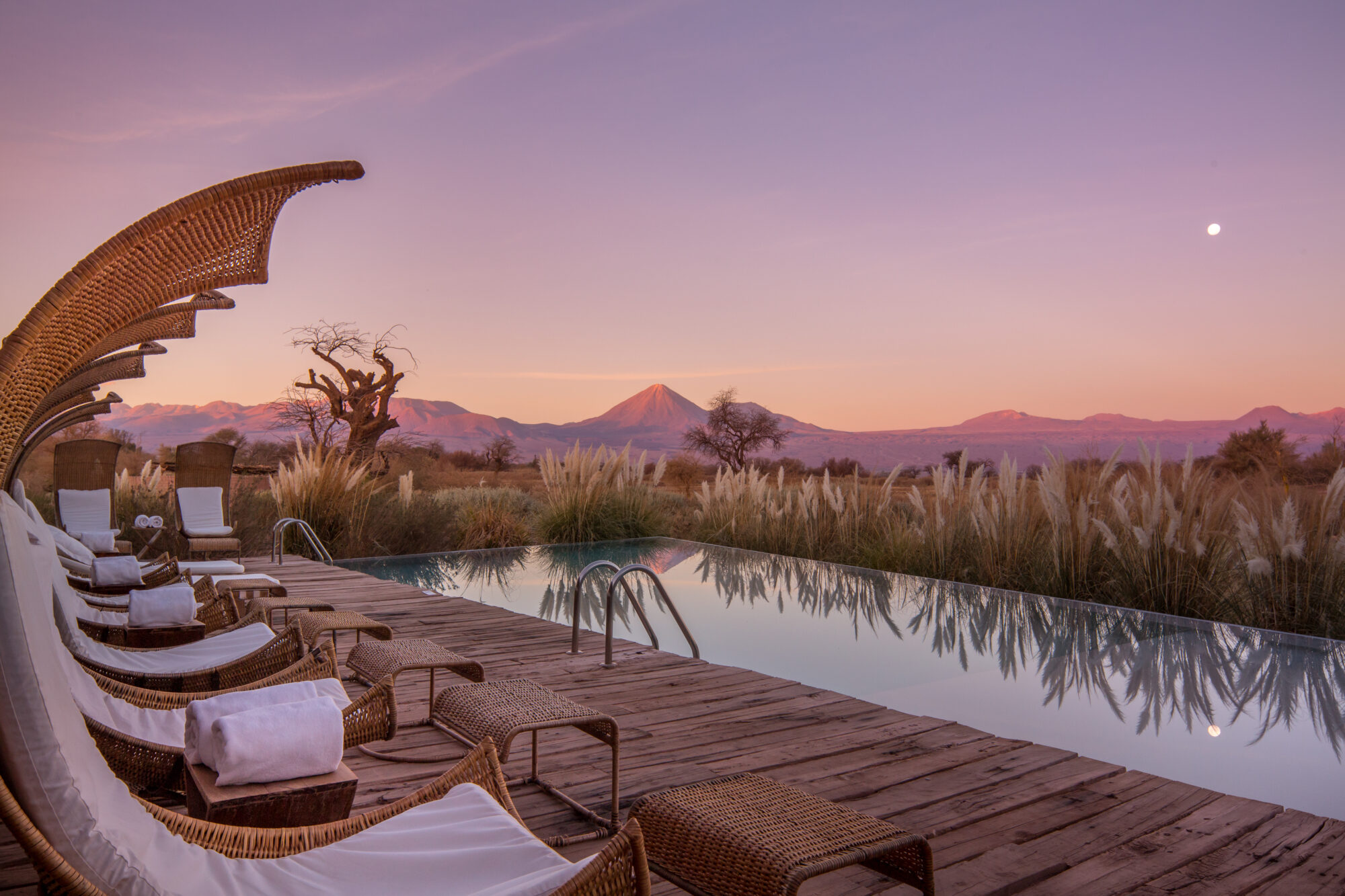 Tierra Atacama pool view dusk by James Flori0 | Where to Travel in 2026 | Tailor-Made Luxury Holiday & Travel Inspiration | The Ultimate Travel Company